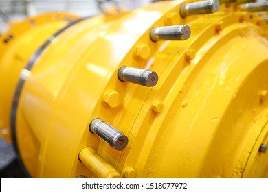 Unrecognizable yellow row part of some machine or station closeup. Deep water bathyscaphe or pressure chamber or gaz hardware concept