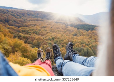 Unrecognizable Young Couple On A Hike In Autumn Forest