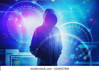Unrecognizable young hacker in black hoodie and jeans standing over HUD futuristic interface background. Concept of cyber security and data protection. Toned image - Shutterstock ID 1524057404