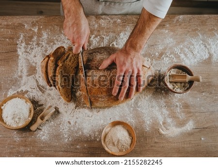 Similar – Foto Bild Frau beim Kneten von handwerklichem Brot auf Holztisch