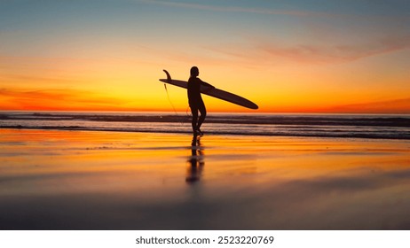 Unrecognizable young surfer woman with wetsuit and surfboard entering the sea - Powered by Shutterstock