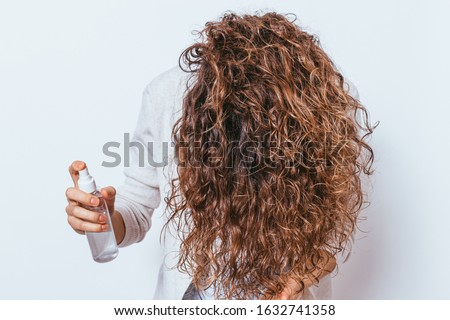 Similar – Image, Stock Photo Unrecognizable curly haired woman admiring mountains