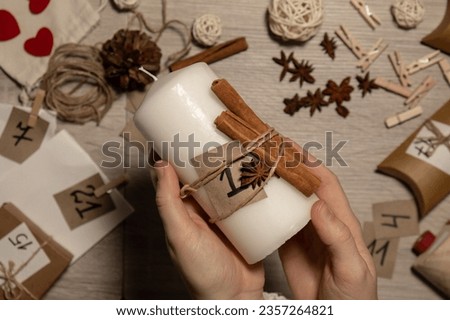 Similar – Image, Stock Photo Unrecognizable young woman crafting with paper and scissors