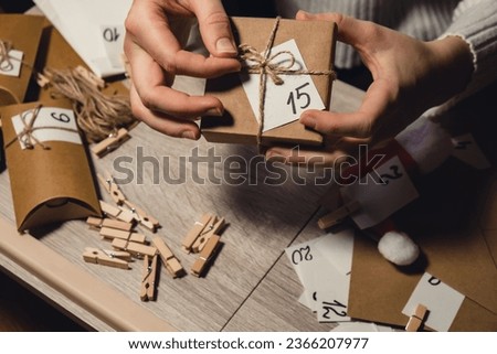 Similar – Image, Stock Photo Unrecognizable young woman crafting with paper and scissors