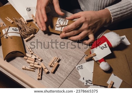 Similar – Image, Stock Photo Unrecognizable young woman crafting with paper and scissors