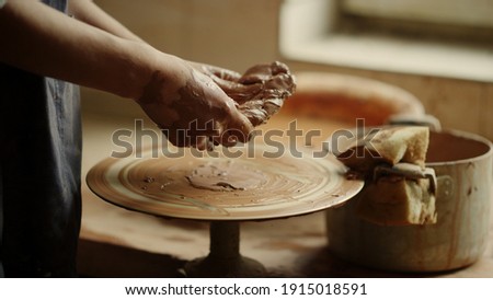 Similar – Image, Stock Photo hands working with clay in a pottery |clay transfer