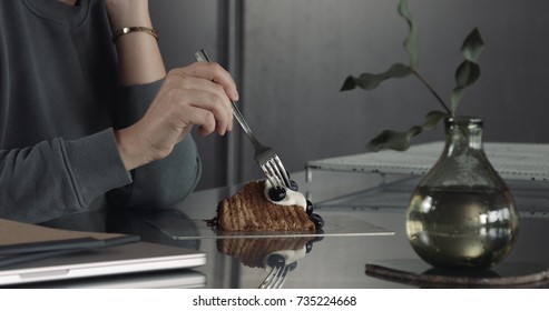 Unrecognizible Woman Take A Slice Of Cake And Ut Fork Then