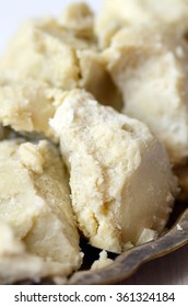 Unrefined Raw Shea Butter On Wooden Background