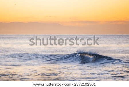 An unridden Californian coastal wave on a crisp fall morning.