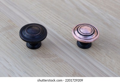 An Un-Sanded And Sanded Common Oil Rubbed Bronze Cabinet Knob Next To A Sanded