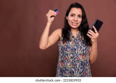 Unsatisfied Client Making Order In Online Store Smartphone App, Stressed Indian Woman Having Ecommerce Website Checkout Problem. Woman Buying Product In Internet Shop, Credit Card Trouble