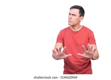 Unsatisfied man showing stop gesture in studio