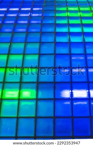 Unsharp squared green and blue neon background texture