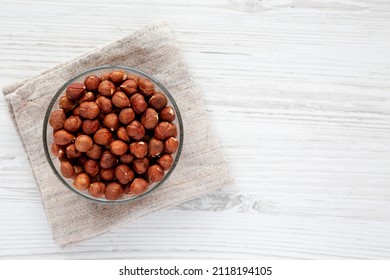 Unshelled Hazelnut In A Bowl, Top View. Flat Lay, Overhead, From Above. Copy Space.