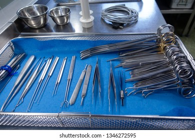 Unsorted Surgical Instruments After Cleaning In The Washing Machine