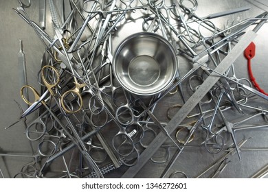 Unsorted Surgical Instruments After Cleaning In The Washing Machine