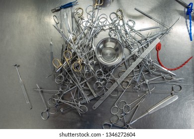 Unsorted Surgical Instruments After Cleaning In The Washing Machine