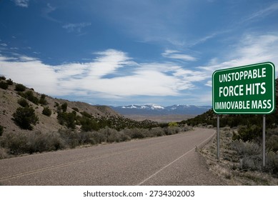 unstoppable force meets immovable object highway sign desert road mountains