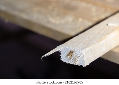 Unsuccessful Cut Of A Wooden Beam Close-up. Burnt Wood Cut Close Up