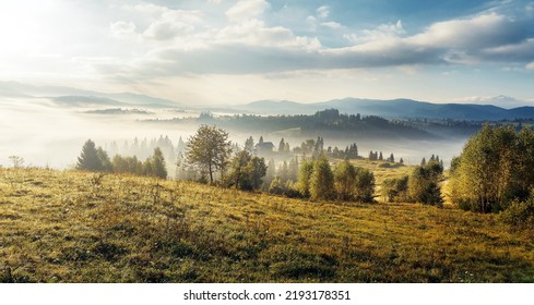 Unsurpassed misty morning in the mountains during sunrise. Amazing nature scenery. Stunning alpine Landscape. Wonderful counfryside with fog under sunlight. picture of wild area. Natural background. - Shutterstock ID 2193178351