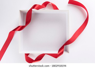 Untie The Red Ribbon Strap And Open The Gift Box