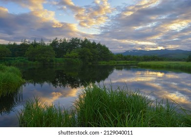 Untouched Nature, Peace And Tranquility On The Taiga River At Sunset. Strait Of Tartary Coast, Hunger River. Khabarovsk Krai, Far East, Russia.