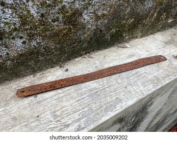 Unused Old Saw Blade In The Garden