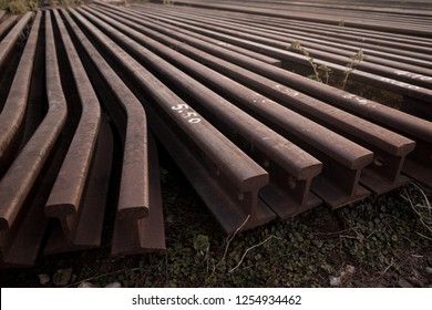 Unused steel rails - Shutterstock ID 1254934462