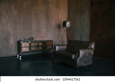 Unusual Loft Interior. Leather Sofa. Room In Brown Color. Luxury Livingroom