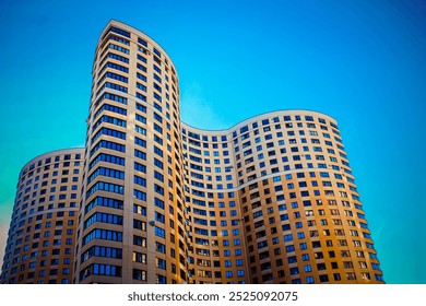 an unusual residential building project. a new urban neighborhood with high-rise multi-storey buildings. dense residential development with many apartments. affordable economy class housing - Powered by Shutterstock