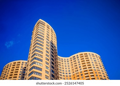 an unusual residential building project. a new urban neighborhood with high-rise multi-storey buildings in St. Petersburg. dense residential development with many apartments.  - Powered by Shutterstock