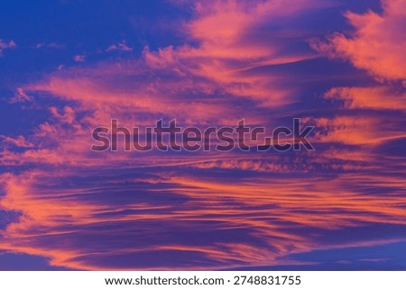 Unusual storm clouds at sunset.  Suitable for background.
