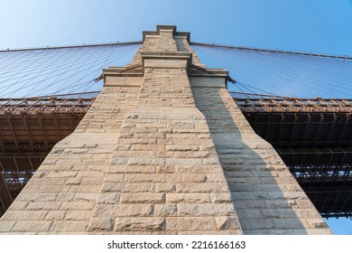 Unusual View Of Brooklyn Bridge Abutment With Beautiful Cloudy Sky