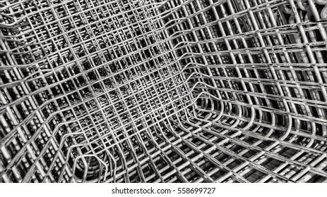 Unusual Viewpoint Of A Stack Of Shopping Baskets