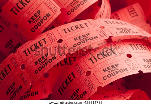Unwound Messy Roll of\
Red Tickets Piled Up.