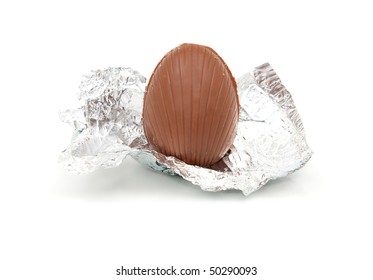 Unwrapped Chocolate Egg In Silver Foil Wrapper