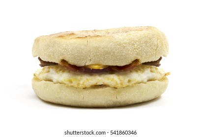 Unwrapped Egg Muffin Sandwich With Cheddar Cheese And Bacon.
