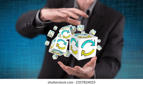Update concept between hands of a man in background