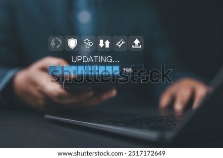 Update software application upgrade technology concept. Man using smart phone, Software update or Operating system, updating progress bar, Install app patch, new version, Improved security,