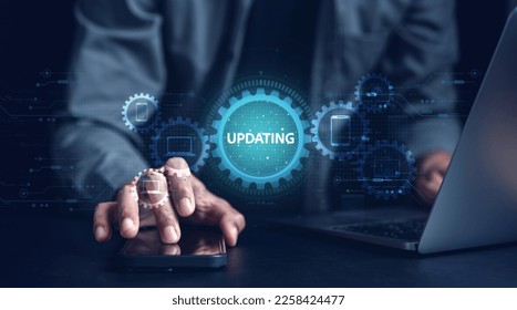 Update software system in computer. Man using smartphone upgrade program, Business technology internet loading virtual bar with installing the update for the quality better.