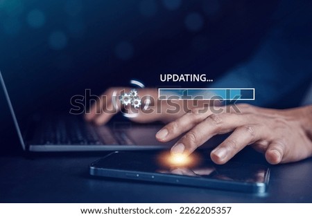 Update software system in computer. Man using smartphone upgrade program, Business technology internet loading virtual bar with installing the update for the quality better.	