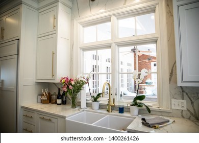 Updated Modern Farmhouse Kitchen Ceramic Sink With Marble Countertops