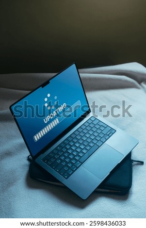 Updating progress bar on computer screen. Installing app patch. Software update or operating system upgrade to keep the device up to date and improve security.