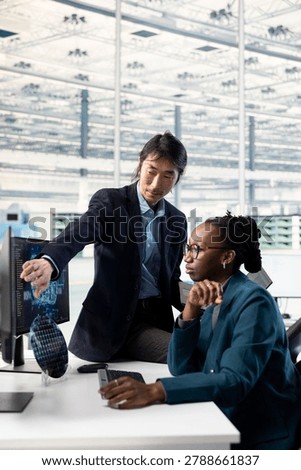 Upgrading microelectronics, experiments and engineering team in microchip RD facility, improving semiconductors bandwidth calculations and African american coworkers looking at performance metrics.