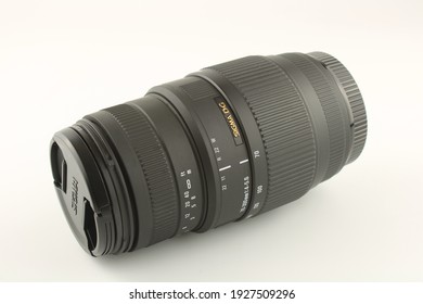 Upholland, Lancashire, UK, 02-03-2021: Camera Lens Sigma 70-300mm F4-5.6 DG With Macro Isolated On White, Photography On A Budget Concept.  Image 1 Of 2