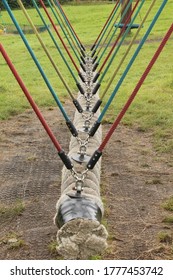 Upholland, Lancashire, UK, 16/07/2020 : Rope Log Swing With Coloured Ropes And Metal Fixings