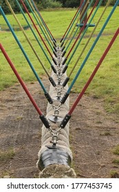 Upholland, Lancashire, UK, 16/07/2020 : Rope Log Swing With Coloured Ropes And Metal Fixings