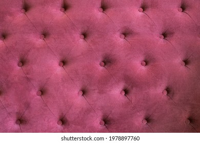 The Upholstery Is Suede Of The Burgundy Sofa. Fabric Red Suede Background