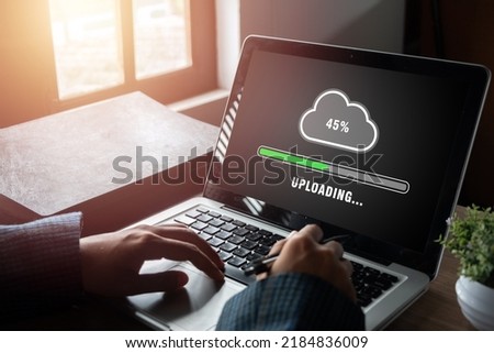 Upload data concept, Woman using laptop computer and waiting for cloud uploading on laptop in office, Data information, Technology network internet Concept.