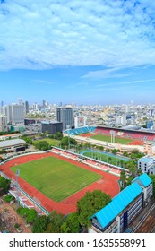 Upper Above Sight View With Many Buildings And Football Field Of Bangkok In Thailand At Day Time